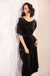 Velvet maxi dress with puff sleeves and soft drape for elegant evening or occasion wear